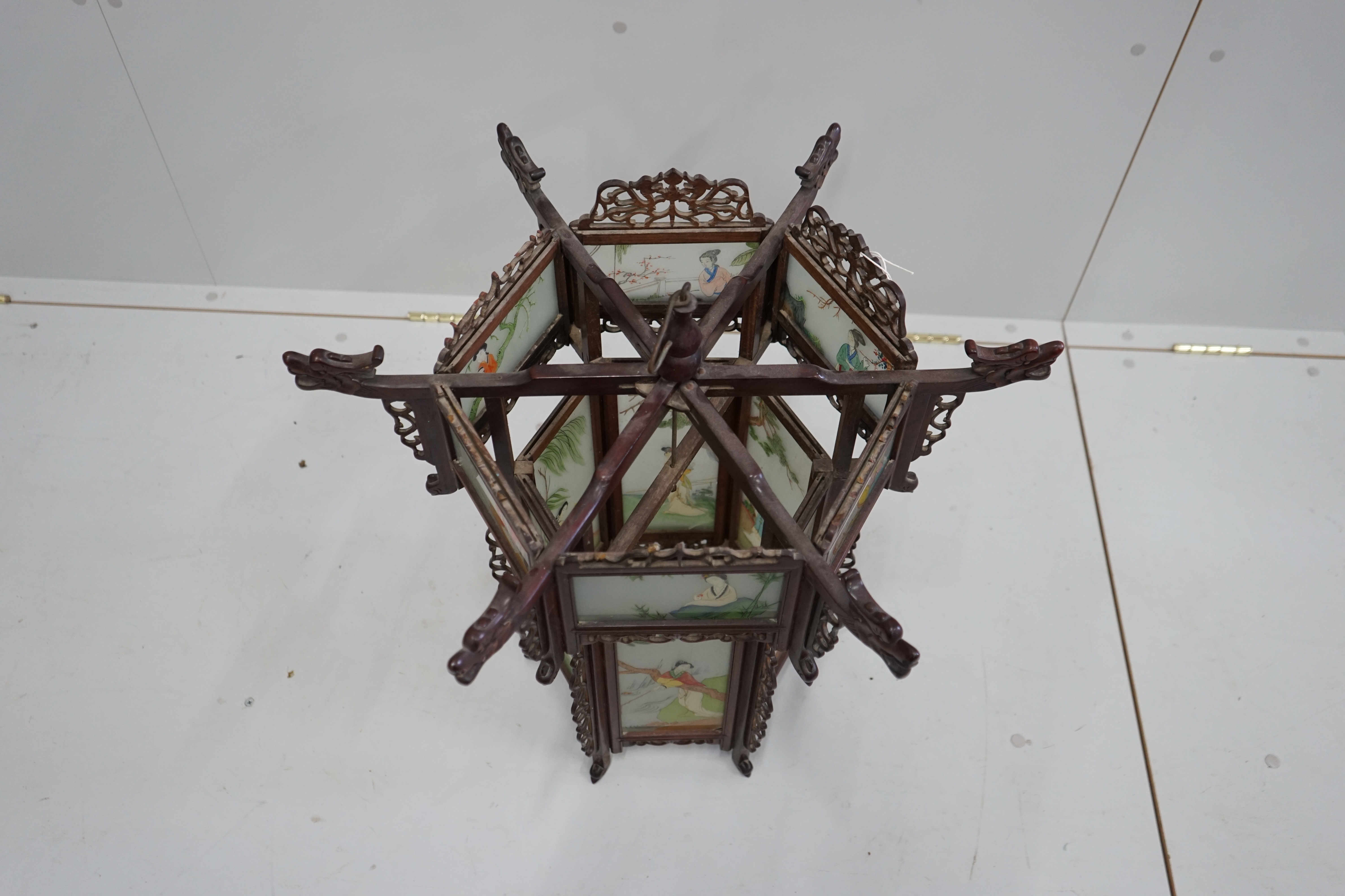 A Chinese hexagonal glass and hardwood lantern, width 62cm, height 58cm